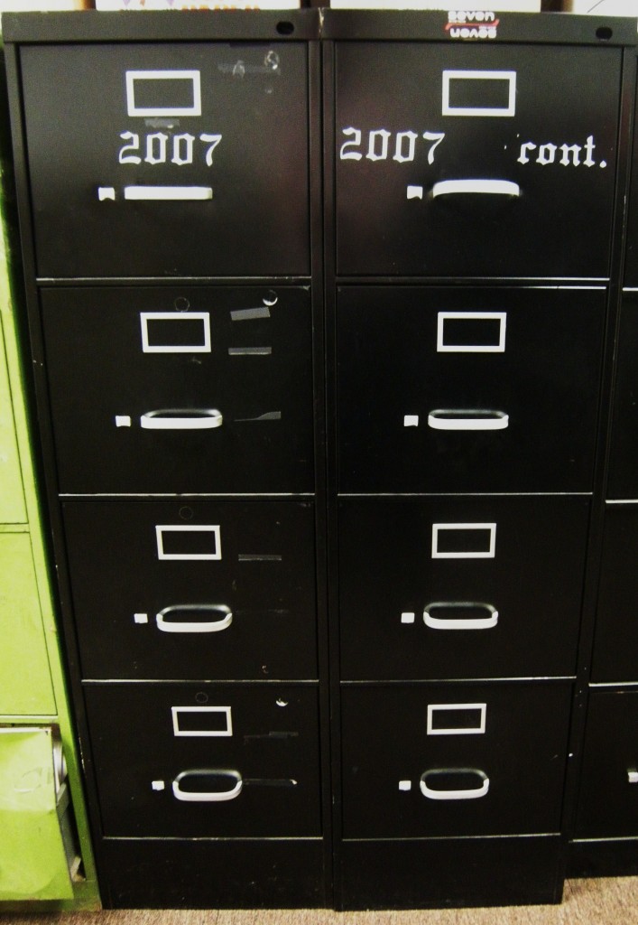 filing cabinets labelled 2007, 2007 cont.