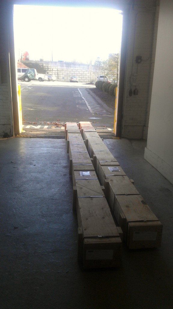 Long wooden crates at the garage door entrance