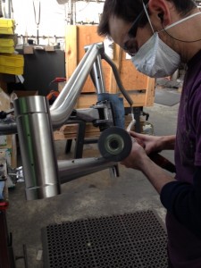 Finsisher wheeling a titanium frame