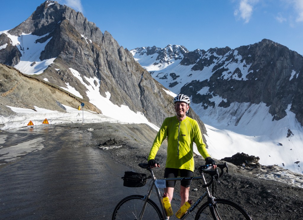 Cyclist next to a mountain