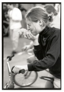 trying to eat a donut while laughing