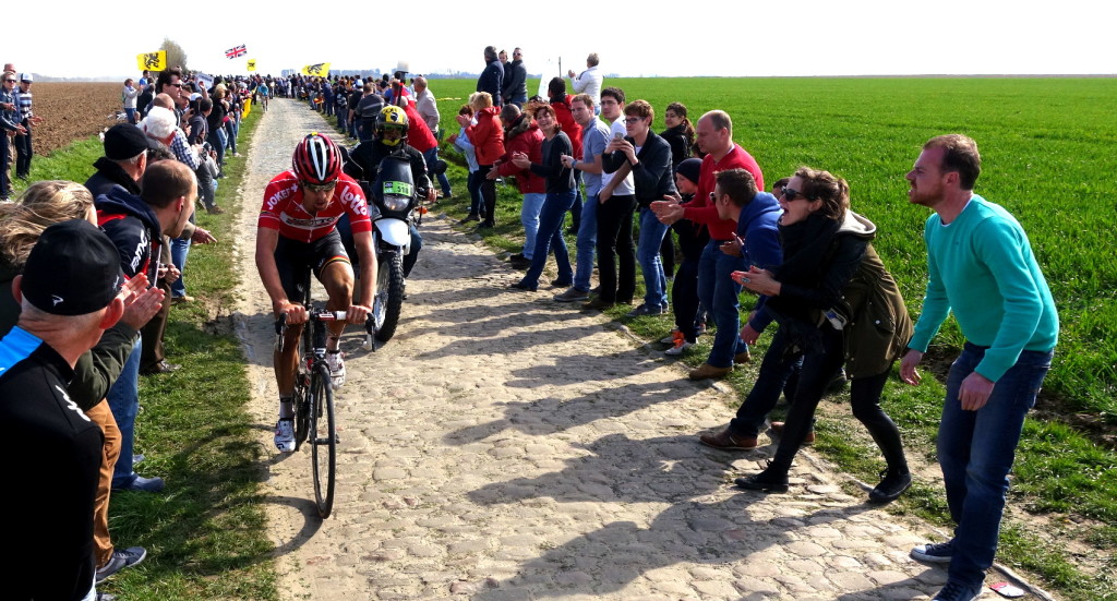 Jurgen Roelandts races as fans cheer him on