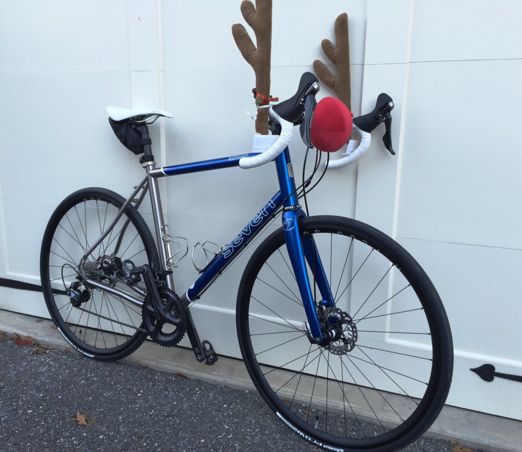 A Superhero Blue Seven Axiom SL adorned with plush antlers and a red nose