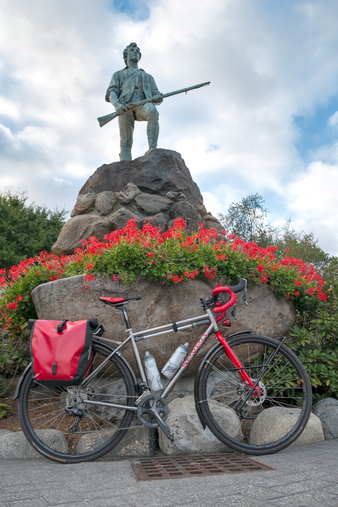 Scarlet Seven in front of Minuteman Statue in Lexington MA.