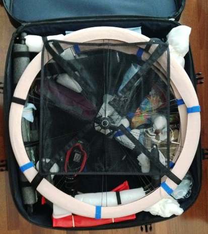 A bike fitted with S and S couplers fits into a square case