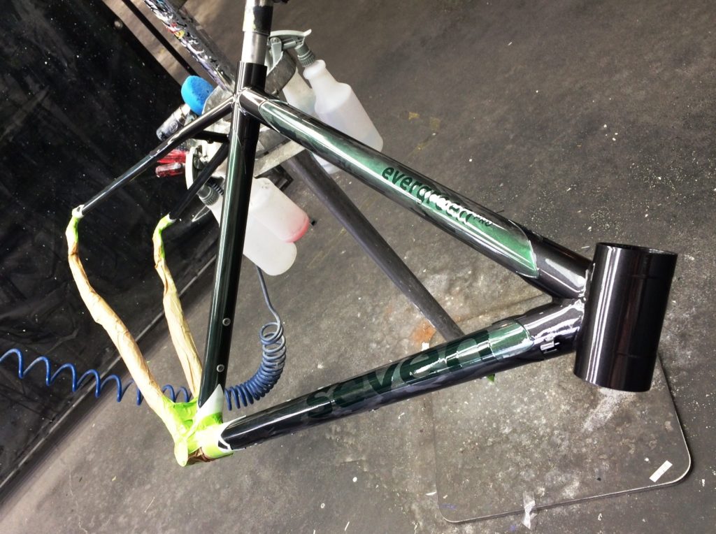 Seven Mudhoney SLX in stand being painted