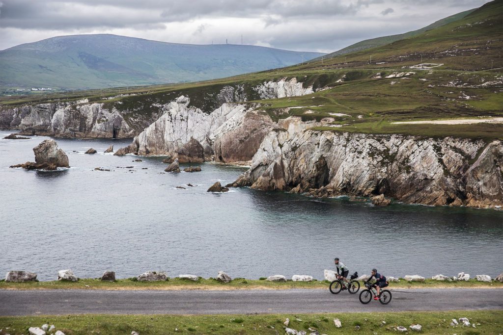 Riding Ireland’s Wild Atlantic Way against the dramatic backdrop of Achill Island.
