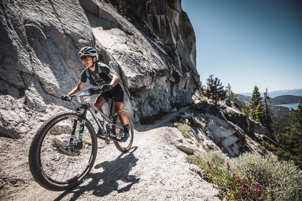 Kelly Catale on a mountian singletrack on her KellCat SL