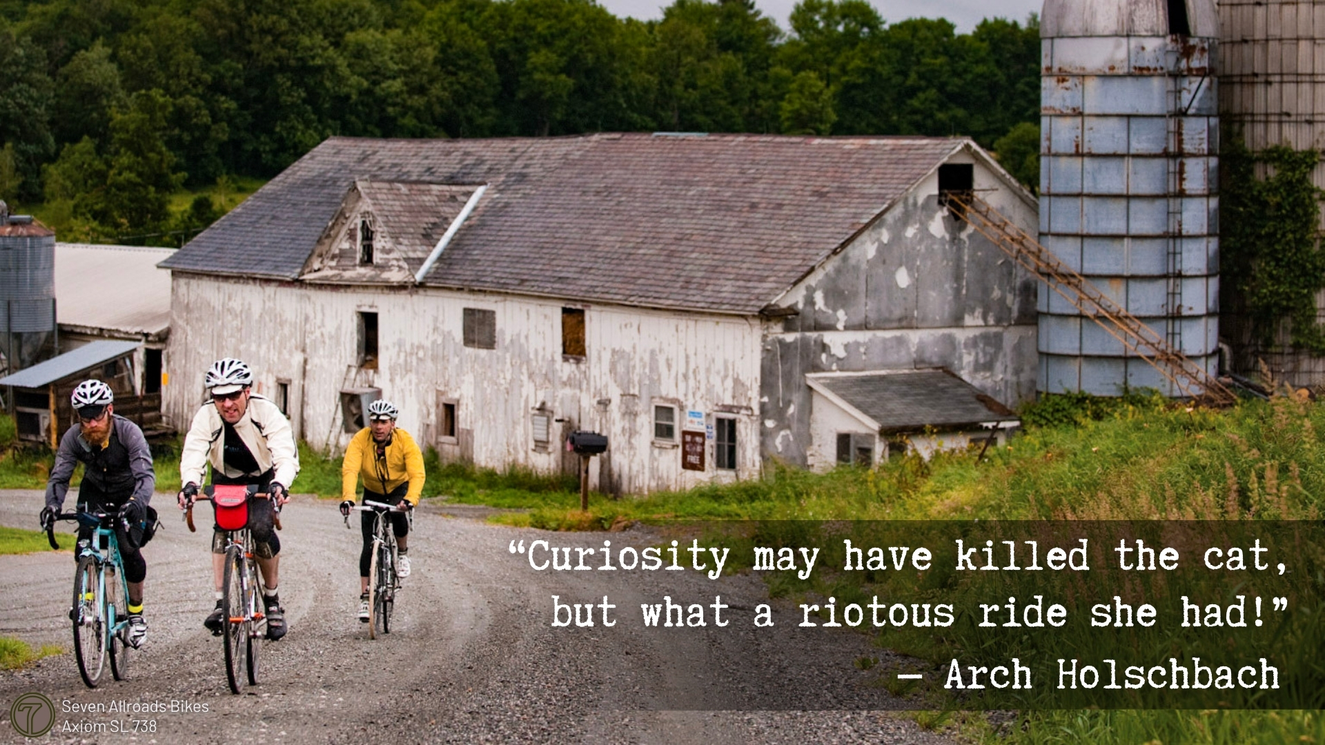 riders passing farm, dirt road